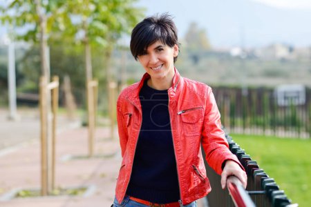 Photo for Mid aged woman wearing casual clothes outdoors - Royalty Free Image