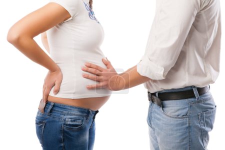 Photo for "Young couple pregnant mother and happy father" - Royalty Free Image