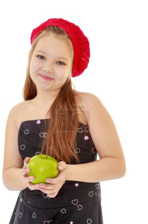 Foto de Adolescente chica sosteniendo una manzana
. - Imagen libre de derechos