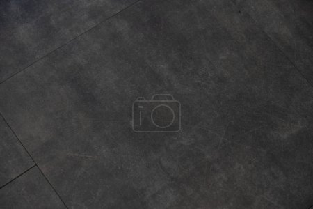 Photo for Slate texture vinyl flooring a popular choice for modern kitchens and bathrooms - Royalty Free Image