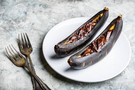 Photo for Grilled bananas with dark chocolate - Royalty Free Image