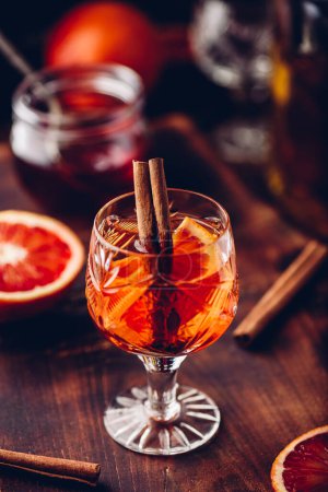 Photo for Glass of orange whiskey sour cocktail - Royalty Free Image