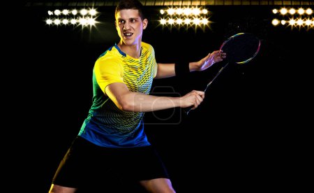 Photo for Badminton player in sportswear with racket and shuttlecock on stadium. - Royalty Free Image