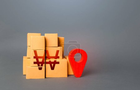 Photo for Boxes with south korean won symbol and red location pin. Import export. Trade in goods. Domestic manufacturer. Supply distribution of goods. Transportation delivering logistics, warehouse management. - Royalty Free Image