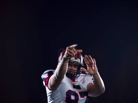 Photo for American football player throwing rugby ball - Royalty Free Image