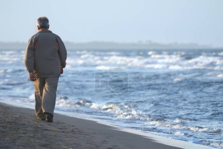 Photo for Senior man on the beach - Royalty Free Image