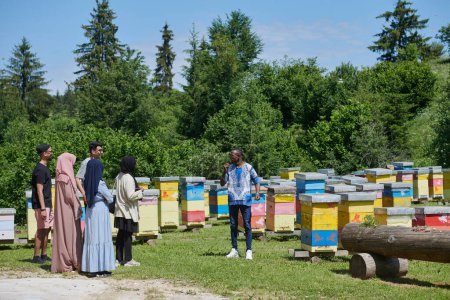 Photo for People group visiting local honey production farm - Royalty Free Image