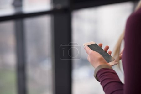 Photo for "business woman using smart phone at office" - Royalty Free Image