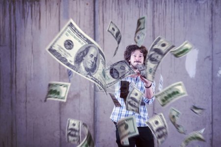 Téléchargez les photos : "homme d'affaires faisant la pluie de l'argent
" - en image libre de droit