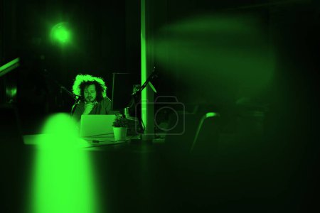 Photo for Young confident businessman relaxing at the desk - Royalty Free Image