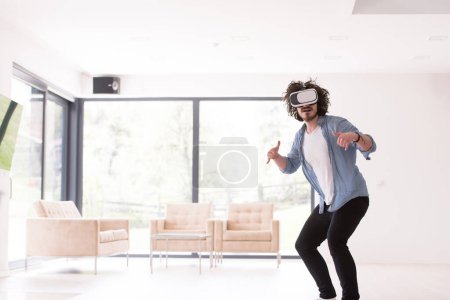 Photo for "man using VR-headset glasses of virtual reality" - Royalty Free Image