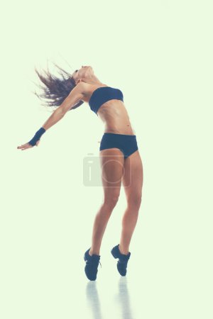 Photo for Stylish and young modern style dancer jumping - Royalty Free Image
