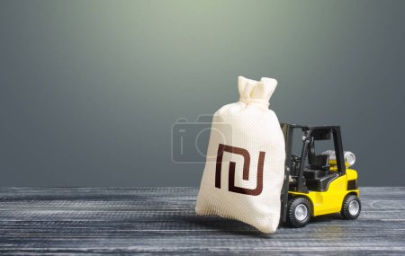 Photo for Forklift transports a israeli shekel money bag. Attraction of investments in business and economy, cheap loans, leasing. Crisis recovery measures. Borrowing on capital market. Stimulating economy. - Royalty Free Image