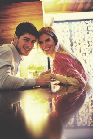Photo for Young couple having a romantic evening date - Royalty Free Image