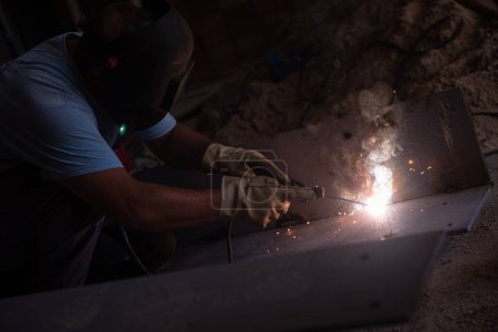 Photo for Welder working with steel at industrial factory - Royalty Free Image