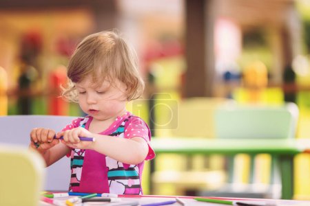 Photo for Little girl drawing a colorful pictures - Royalty Free Image