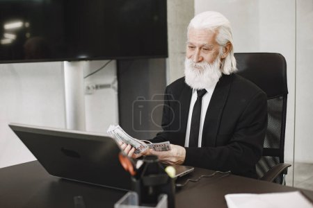 Photo for Handsome pensive mature businessman in formal suit - Royalty Free Image