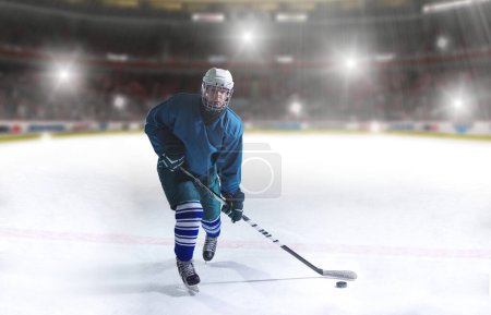 Photo for Ice hockey player in action - Royalty Free Image