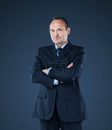 Photo for Confident businessman isolated on a dark background. - Royalty Free Image