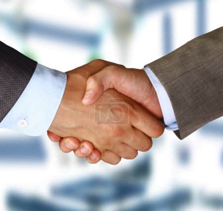 Photo for Closeup of a business hand shake between two colleagues - Royalty Free Image