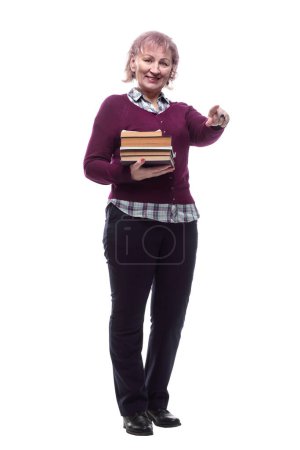 Téléchargez les photos : Femme avec une pile de livres attirant votre attention - en image libre de droit