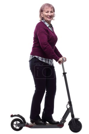 Photo for Friendly elderly woman on an electric scooter. isolated on a white - Royalty Free Image
