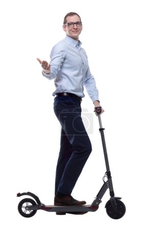 Photo for Side view. casual man with electric scooter looking at you - Royalty Free Image
