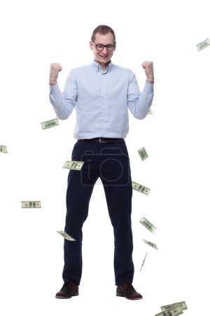 Photo for Happy man standing in the rain of banknotes. isolated on a white - Royalty Free Image