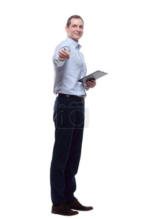 Photo for Smiling man with a clipboard pointing at you - Royalty Free Image