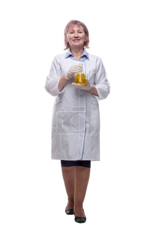 Photo for Female scientist with a lab flask striding towards - Royalty Free Image
