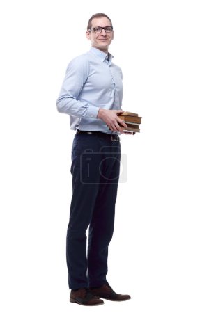 Photo for Friendly young man with a stack of books. isolated on a white - Royalty Free Image