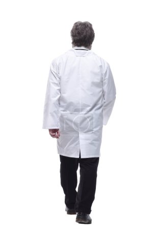 Photo for Confident male doctor rushes to the call. isolated on a white - Royalty Free Image