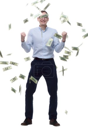 Photo for Happy man standing in the rain of banknotes. isolated on a white - Royalty Free Image
