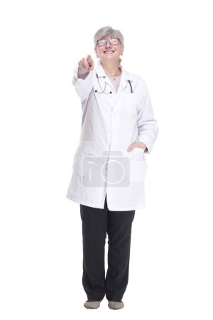 Photo for "smiling woman doctor pointing at you. isolated on a white backgr" - Royalty Free Image