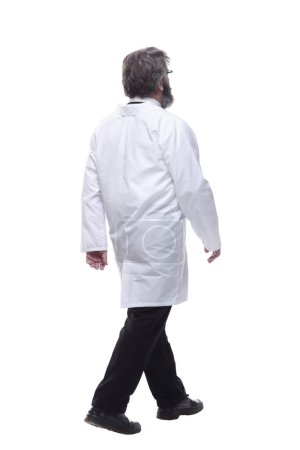 Photo for Confident male doctor rushes to the call. isolated on a white - Royalty Free Image