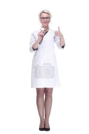 Photo for Young doctor with a stethoscope showing a thumbs up. - Royalty Free Image
