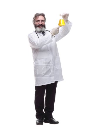 Photo for Smiling doctor with a laboratory flask . isolated on a white - Royalty Free Image