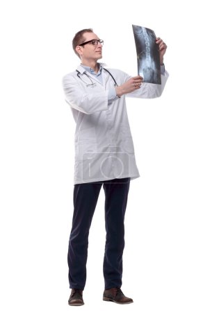 Photo for Attentive doctor with an x-ray of the patient. isolated - Royalty Free Image