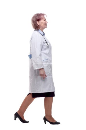 Photo for Serious woman doctor hurries to the patient . isolated on a white - Royalty Free Image