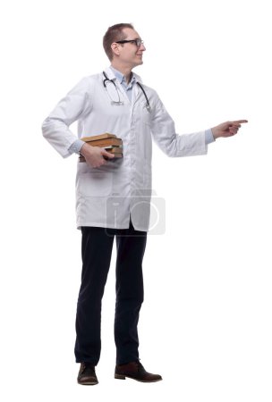 Photo for Doctor with a stack of books pointing at the white screen . - Royalty Free Image