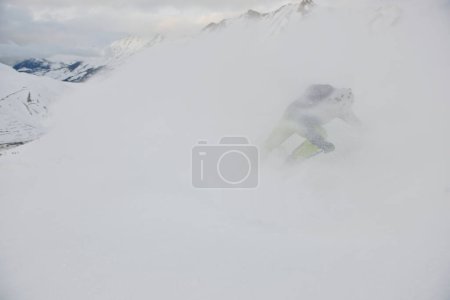 Photo for Skiing on fresh snow at winter season at beautiful sunny day - Royalty Free Image