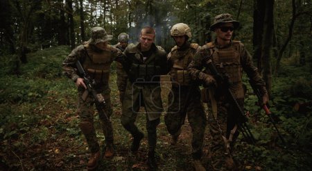 Photo for Marines capture terrorist  alive - Royalty Free Image