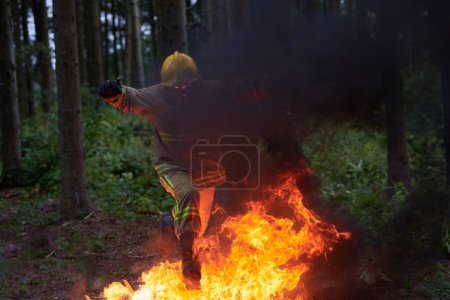 Photo for Portrait of firefighter in action - Royalty Free Image
