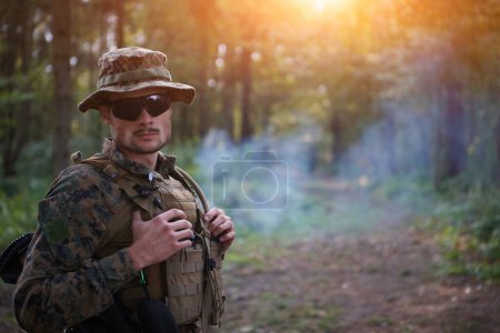 Photo for Portrait of soldier in forest - Royalty Free Image