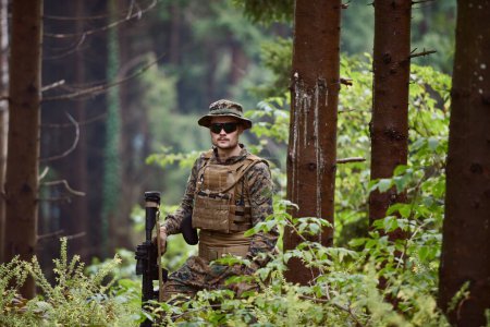 Photo for Portrait of soldier in forest - Royalty Free Image