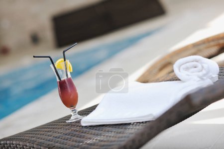 Photo for Towels and coctail drink - Royalty Free Image