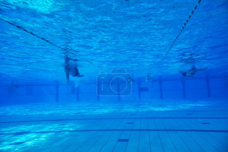 Photo for View of man in swimming pool underwater - Royalty Free Image