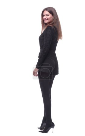 Photo for "rear view. smiling young woman looking at you." - Royalty Free Image