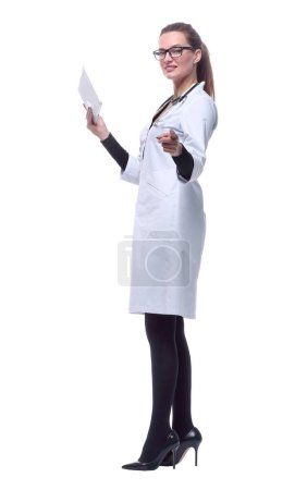 Photo for Side view. female doctor with a digital tablet pointing at you. - Royalty Free Image
