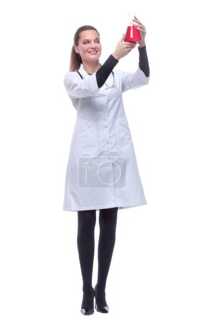 Photo for "in full growth. smiling woman doctor with a laboratory flask." - Royalty Free Image